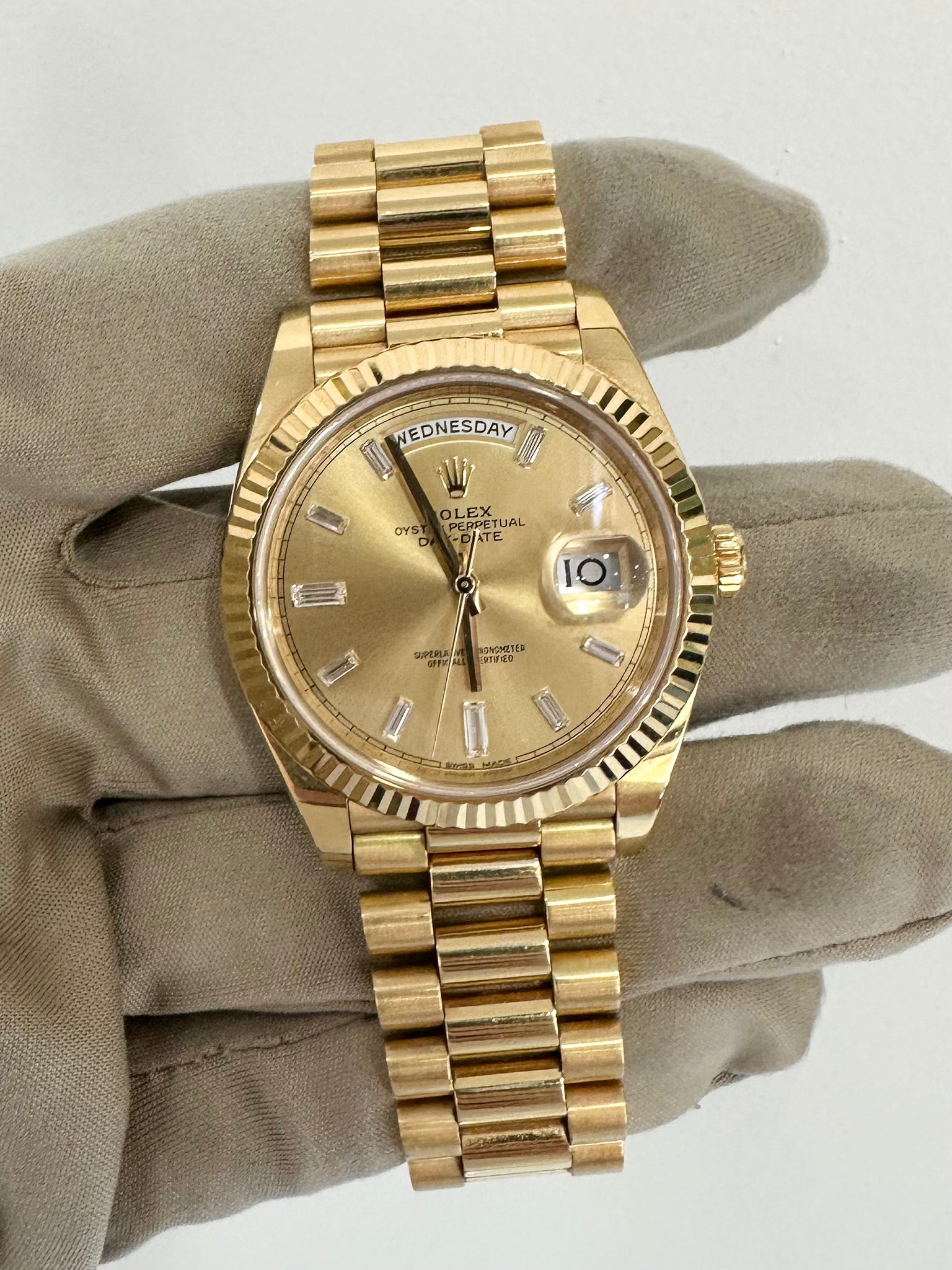 Rolex Day-Date 40 Yellow Gold Champagne Baguette Diamond Dial Exclusive Time Zone